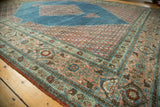Distressed vintage Mahal carpet border with worn floral motifs in blush and aqua.