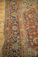 Antique Mahal's navy border, classic turtle samovar motif, rust Herati field, worn edge.