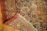 Antique Mahal rug detail: hand-knotted backing, low pile, and rust, ivory, navy Herati design.