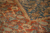 Low pile texture with time-softened terra cotta and blue Herati motifs on antique Mahal.