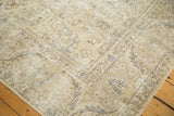 Distressed Vintage Turkish Sparta carpet, with analogous ivory and beige patterns and faint contrast.