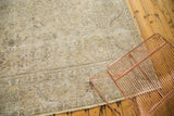 Distressed vintage Sparta carpet featuring subtle tone-on-tone patterns and short fringe.