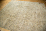 Distressed vintage Sparta carpet with faint allover pattern and oxidized silver, beige tones.