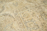 Distressed texture and faint tone-on-tone patterns on a vintage Sparta carpet.