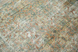 Distressed Mahal rug showcasing Herati motif with worn pile in pale terra cotta and teal.