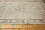 Distressed vintage Khotan rug from Uzbekistan with allover geometric vinery, faded silver, blush, ivory.