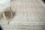 Vintage Birjand carpet's textured pile, displaying allover herati motif in pale powder blue and ivory.