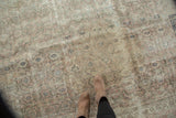 Distressed Sivas rug, featuring a soft Herati pattern with tone-on-tone silver and blush.