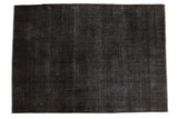 Distressed overdyed Sivas hand-knotted carpet, charcoal black with subtle indigo texture, 8'7