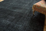 Distressed vintage Sivas carpet with charcoal and indigo overdyed texture and faint foundation.