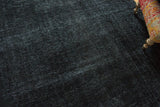 Distressed texture on the charcoal black and inky indigo overdyed Sivas.