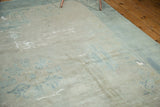 Distressed antique Peking carpet, showing low pile, exposed foundation, and faded pictorial motifs.