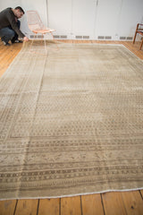 Vintage Mir Sarouk carpet corner with intricate borders, boteh patterns, and even pile wear.