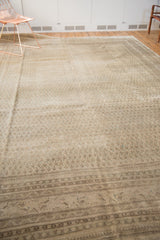 Intricate boteh field of the vintage Mir Sarouk carpet, with detailed border and even wear across knot heads.