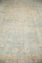 Distressed Sivas carpet pile showing sea foam green and antique ivory European florals.