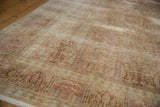 Faded pink cypress tree motifs and worn pile on distressed Kashmir silk carpet.