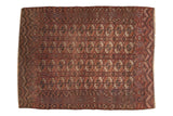 Antique Turkmen carpet with Bokhara gul motifs in madder red, ivory, and chestnut brown, 6'1