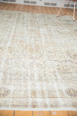 Detail of distressed vintage Sivas carpet showing wear to knot heads and exposed foundation.