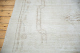 Distressed pile texture with subtle ivory and coffee brown rococo style outlines.