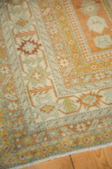 Corner detail of distressed vintage Northwest Persian rug, blue, terra cotta, and ivory Laleh Abassi pawn design.