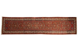 Antique Malayer rug runner with an allover Herati motif in brick red, bronze, and denim blue.