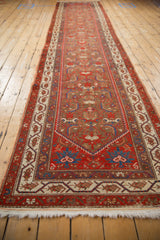 Angled perspective of the antique Malayer runner, showcasing the long repeat of its Herati field pattern.