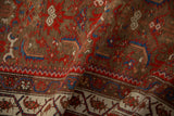 Meandering vine Serbend border against the bronze Herati field of an antique Malayer runner.
