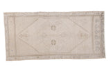 Vintage Distressed Oushak rug, tone-on-tone ivory and silver with hexagonal medallion.