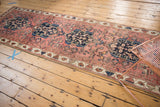 Hand-knotted Antique Malayer runner corner, displaying dusty blush and indigo traditional patterns.