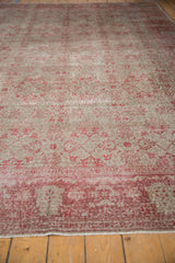 Distressed Oushak pile, mostly even wear with faint foundation, silver and raspberry florals.