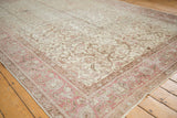 Vintage Distressed Sivas carpet with allover scrolling vinery, blush, and ivory tones.