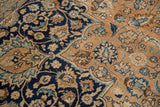 Vintage Persian Meshed carpet detail with intricate vinery, palmettes in navy, bronze, and sky blue.