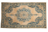 Vintage distressed Sivas carpet, oversized medallion, pale apricot, dusty teal floral motifs. 6'7