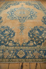 Even wear on vintage Sivas carpet, revealing soft apricot and dusty teal patterns.