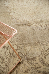 Distressed vintage Turkish Sparta carpet with faded European style Rococo pattern.