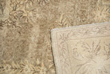 Distressed beige-brown pile and Rococo patterned reverse of a vintage Sparta carpet.