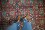 Vintage Tabriz rug featuring intricate Safavid palmette and lotus lattice.
