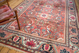 Vintage Mahalati carpet fringe and corner detail with navy, blush, and aqua vine border.