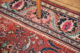 Vintage Persian Mahalati rug's scrolling floral tendrils, palmettes, cherry red, aqua, navy.