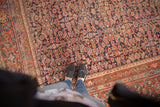 Antique Persian Mahal carpet with allover herati pattern; navy field, madder root red, oxidized green.