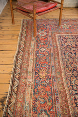 Antique Persian Mahal carpet border, madder root red herati motif, oxidized copper green, and low pile fringe.