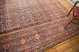Intricate borders of antique Persian Mahal carpet, with madder red, sky blue, and copper green.