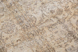 Distressed beige pile and chocolate brown floral vine motifs on a vintage Sivas carpet.