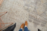 Distressed pile of the vintage Sparta carpet with slate grey and antique ivory pattern.