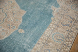 Even wear on a distressed Sivas carpet, blending sky blue pile with the ivory foundation.