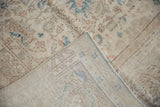 Tidy hand-knotted foundation and low, distressed pile on a vintage Sivas carpet corner.