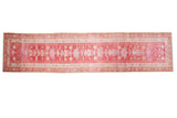 Distressed pink and ivory Oushak runner, repeating floral and curvilinear motifs, 2'11