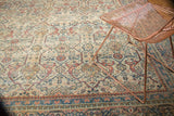 Distressed vintage Mahal carpet, Farahan Sarouk style, ivory, terra cotta, blue, mostly even wear.