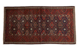 Vintage Belouch runner, repeating geometric floral field in deep reds, navy, ivory, 3'6