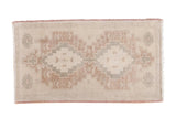 Distressed hand-knotted Oushak rug with double medallion, faded ivory, silver, and burgundy tones, 1'10